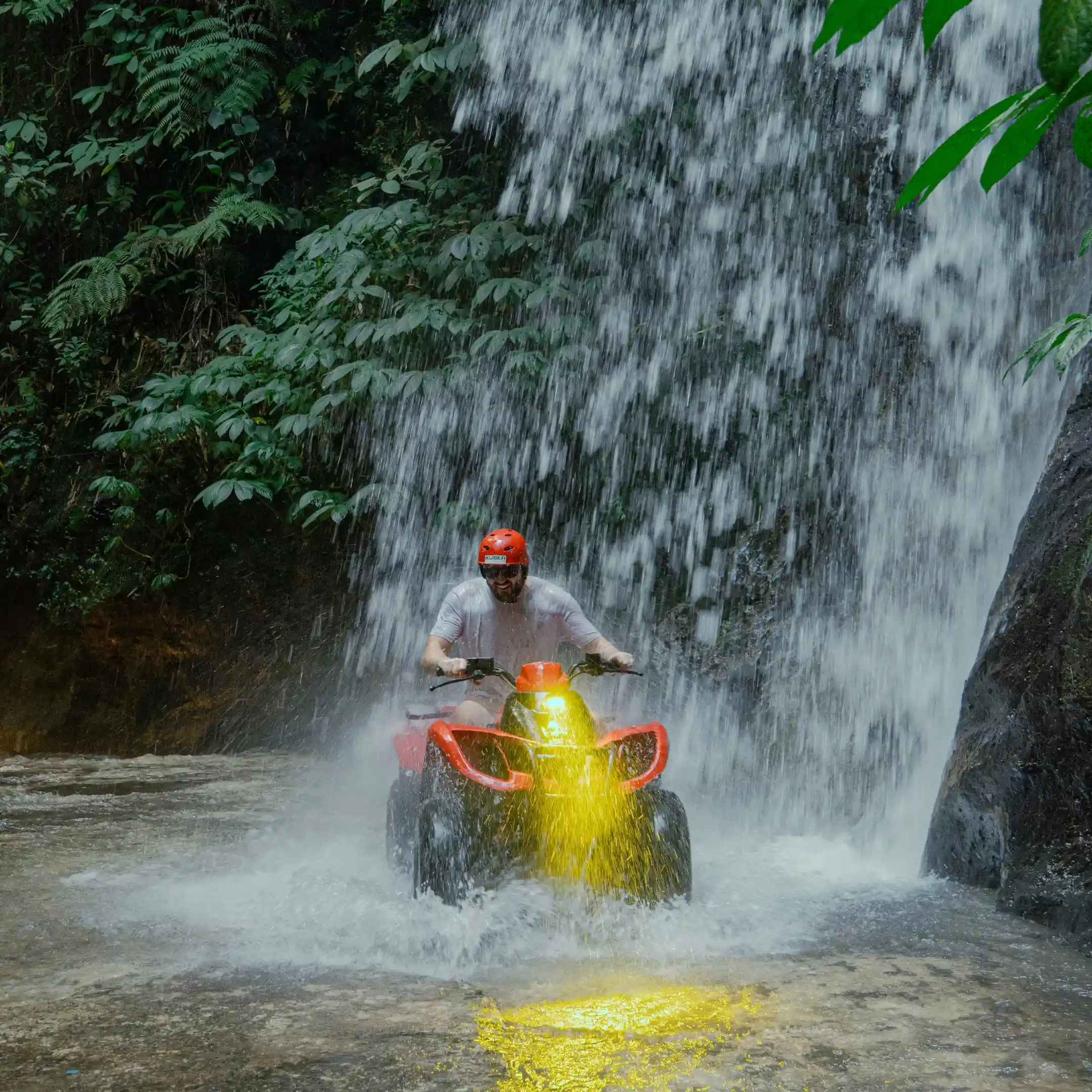 Quad bike inside the red-rock cave tunnel